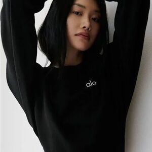 ALO Devotion Crew Neck Pullover sweatshirt.